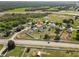 Property in residential neighborhood with proximity to a major highway, featuring scenic green spaces at 6006 Country Walk Ln, Winter Haven, FL 33880