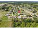 Discover this neighborhood from above, showcasing the beautiful landscaping and convenient location at 6006 Country Walk Ln, Winter Haven, FL 33880