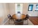 Eat-in kitchen featuring a round table with seating for four, and natural light at 6006 Country Walk Ln, Winter Haven, FL 33880