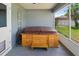 Relax in this covered hot tub on a screened porch, perfect for enjoying the outdoors in comfort at 6006 Country Walk Ln, Winter Haven, FL 33880
