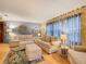 Cozy living room with comfortable sofas, soft lighting, and inviting decor at 6044 Grand Oaks Se Dr, Winter Haven, FL 33884