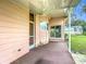 Cozy covered patio perfect for outdoor relaxing at 6044 Grand Oaks Se Dr, Winter Haven, FL 33884