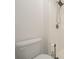 Bright bathroom featuring a modern shower and a stylish toilet paper holder at 647 Washington Way, Haines City, FL 33844