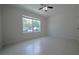 Empty bedroom with a view to outside at 647 Washington Way, Haines City, FL 33844
