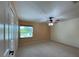 Bright bedroom with a window and carpeted flooring at 7200 Green Pine Ct, Orlando, FL 32819