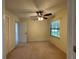 Bedroom with a ceiling fan and carpeted flooring at 7200 Green Pine Ct, Orlando, FL 32819