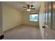 Bedroom with ceiling fan and carpeted floor at 7200 Green Pine Ct, Orlando, FL 32819