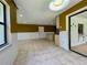 Open floor plan featuring tile floors, recessed lights, and a view of the kitchen at 7200 Green Pine Ct, Orlando, FL 32819