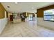 Open kitchen and dining area featuring tile floors, recessed lighting and stainless appliances at 7200 Green Pine Ct, Orlando, FL 32819
