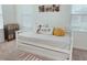 Bright bedroom with a daybed, decorative pillows, and a whimsical style at 726 Longboat, Davenport, FL 33896