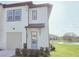 Charming two-story home with manicured lawn and a view of the lake at 726 Longboat, Davenport, FL 33896
