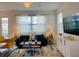 Stylish living room features a modern design, natural light, and comfortable seating arrangements at 726 Longboat, Davenport, FL 33896
