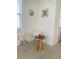 Cozy corner with stylish chairs and a wooden side table by the window at 726 Longboat, Davenport, FL 33896