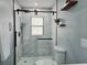 Modern bathroom with a sleek glass-enclosed shower and contemporary fixtures at 726 Marion Oaks Ln, Ocala, FL 34473