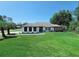 Beautiful home with a manicured lawn, showcasing its curb appeal and inviting atmosphere at 726 Marion Oaks Ln, Ocala, FL 34473