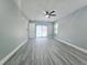 Open bedroom leading to a screened lanai and pool area at 726 Marion Oaks Ln, Ocala, FL 34473
