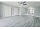 Spacious bedroom with generous closet space and adjacent french doors at 726 Marion Oaks Ln, Ocala, FL 34473