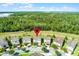 Beautiful aerial view of single-Gathering homes backing to green space and mature trees at 7527 Marker Ave, Kissimmee, FL 34747