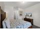 Comfortable primary bedroom suite featuring a large bed and a television at 7527 Marker Ave, Kissimmee, FL 34747