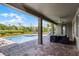 Inviting outdoor pool area with pavers and lush landscaping, perfect for relaxation and entertainment at 7527 Marker Ave, Kissimmee, FL 34747