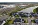 Aerial view of home near waterway and new construction shows desirable location with modern amenities at 9004 Santorini Dr, Orlando, FL 32827
