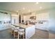 Bright, contemporary kitchen with a large island, stainless steel appliances, and sleek cabinetry at 9004 Santorini Dr, Orlando, FL 32827