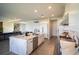 Bright, open kitchen with a large marble island, modern appliances, and ample counter space at 9004 Santorini Dr, Orlando, FL 32827