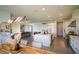 Open concept kitchen with marble countertops, stainless steel appliances, and seamless layout at 9004 Santorini Dr, Orlando, FL 32827
