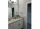 Bathroom showcasing a vanity with granite countertop and modern fixtures at 9318 Mclaren Aly, Winter Garden, FL 34787