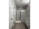 Neutral bathroom featuring a walk-in shower and granite countertops at 9318 Mclaren Aly, Winter Garden, FL 34787