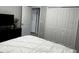 Bedroom featuring white walls, carpet and a large closet at 9318 Mclaren Aly, Winter Garden, FL 34787