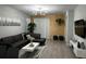 Living room featuring comfortable seating and stylish decor at 9318 Mclaren Aly, Winter Garden, FL 34787