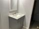 Updated bathroom features a modern vanity with marble countertop and updated hardware at 940 Fenton Ln # 8, Lakeland, FL 33809