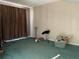 Bedroom with a large window and carpeting at 940 Fenton Ln # 8, Lakeland, FL 33809