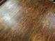 Close-up of the brown wood-look flooring at 940 Fenton Ln # 8, Lakeland, FL 33809