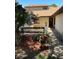 Exterior shot of a walkway, front door, and landscaped yard at 940 Fenton Ln # 8, Lakeland, FL 33809