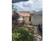 Charming one-story home featuring a well-maintained front yard, a private entrance, and an attached garage at 940 Fenton Ln # 8, Lakeland, FL 33809