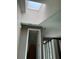 Bright hallway with a skylight at 940 Fenton Ln # 8, Lakeland, FL 33809