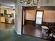 The Kitchen features tan cabinets, dark wood flooring, and stainless steel appliances at 940 Fenton Ln # 8, Lakeland, FL 33809