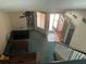 Bright living area with a ceiling fan, tiled entryway, and staircase to the upper floor at 940 Fenton Ln # 8, Lakeland, FL 33809