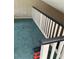Carpeted loft area overlooking the main living space, great for a flexible living space at 940 Fenton Ln # 8, Lakeland, FL 33809