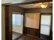 Cozy sunroom featuring new flooring, natural light, and a sliding door for easy outdoor access at 940 Fenton Ln # 8, Lakeland, FL 33809