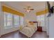 Cozy bedroom with a comfortable bed, stylish decor, and plenty of natural light at 1101 Marcello Blvd, Kissimmee, FL 34746