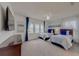 Spacious bedroom featuring 2 twin beds, mounted TV and large windows providing natural light at 1101 Marcello Blvd, Kissimmee, FL 34746
