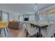 Open-concept living and dining area with stylish furnishings and plenty of natural light at 1101 Marcello Blvd, Kissimmee, FL 34746