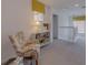 Open loft space with large windows and a view of the staircase at 1101 Marcello Blvd, Kissimmee, FL 34746