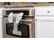 Stainless steel oven with white cabinets and granite countertops at 1101 Marcello Blvd, Kissimmee, FL 34746