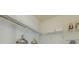 Functional walk-in closet with efficient shelving for clothes and accessories at 1101 Marcello Blvd, Kissimmee, FL 34746