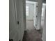 An empty bedroom with neutral walls and flooring and a large window at 1140 Merrill St, Davenport, FL 33837