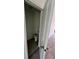 Powder room with tile floors and white toilet at 1140 Merrill St, Davenport, FL 33837